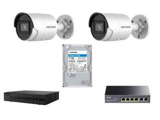 Комплект на четыре камеры и регистратор с PoE коммутатором 2063G2+104mh-c+fs1006p